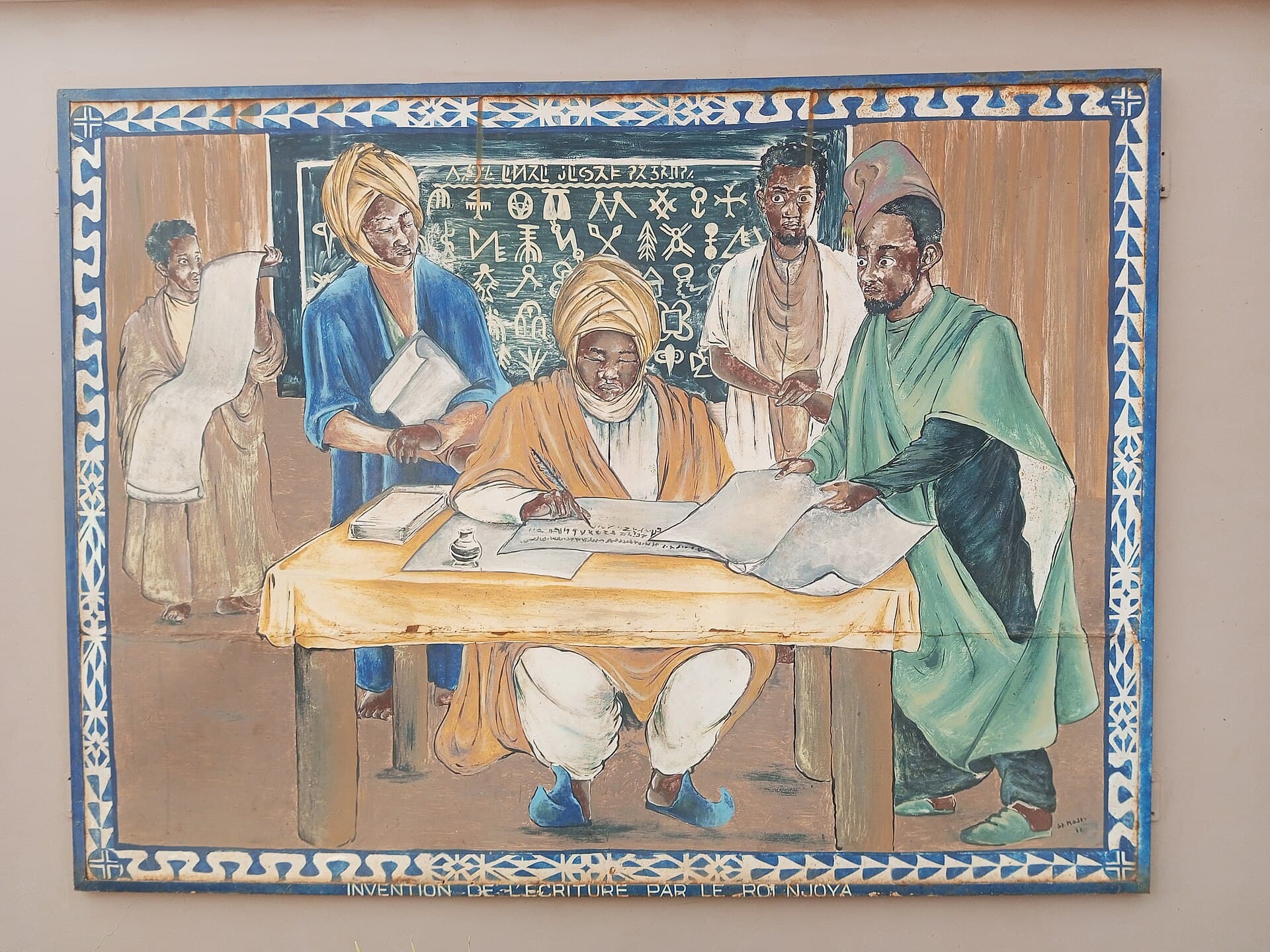Une fresque montrant le roi Njoya et l’écriture bamoun